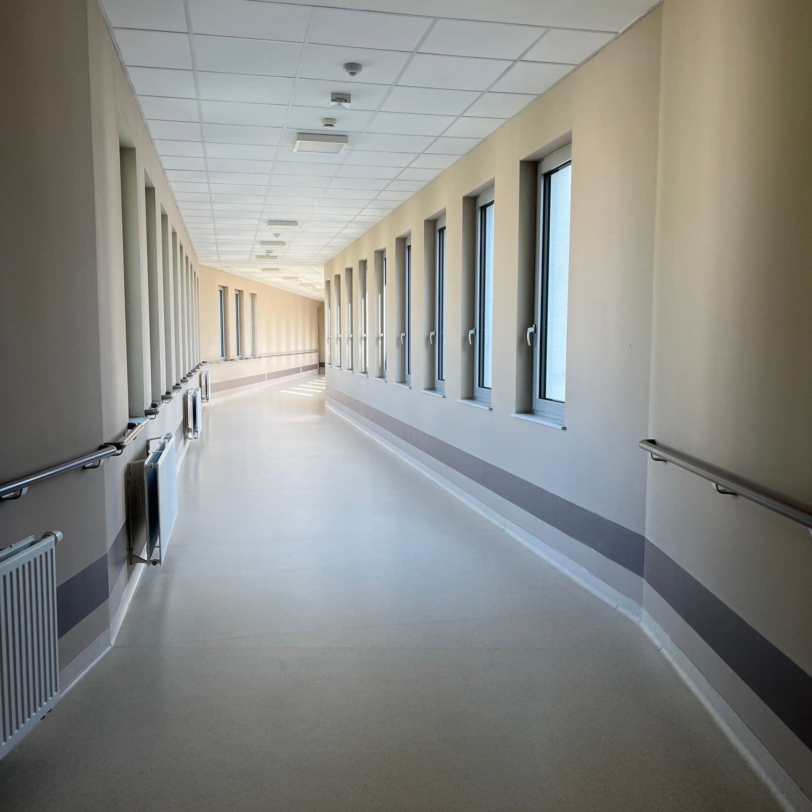 Hospital corridor representing private health insurance tiers