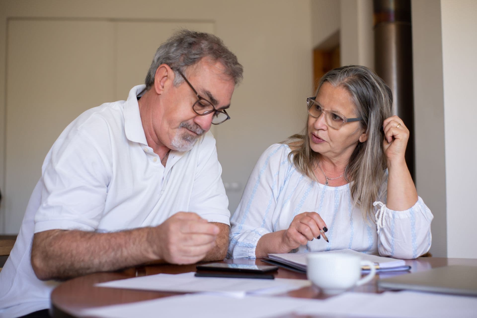 Older household reviewing a winter gas bill together