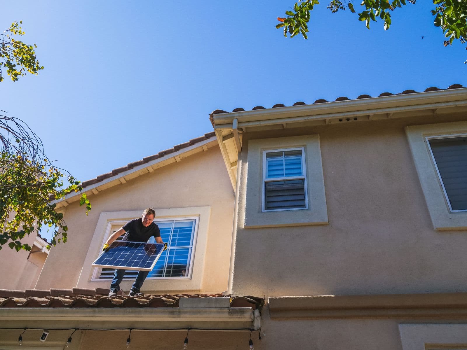 Solar panels on a roof for an Origin solar feed-in tariffs guide
