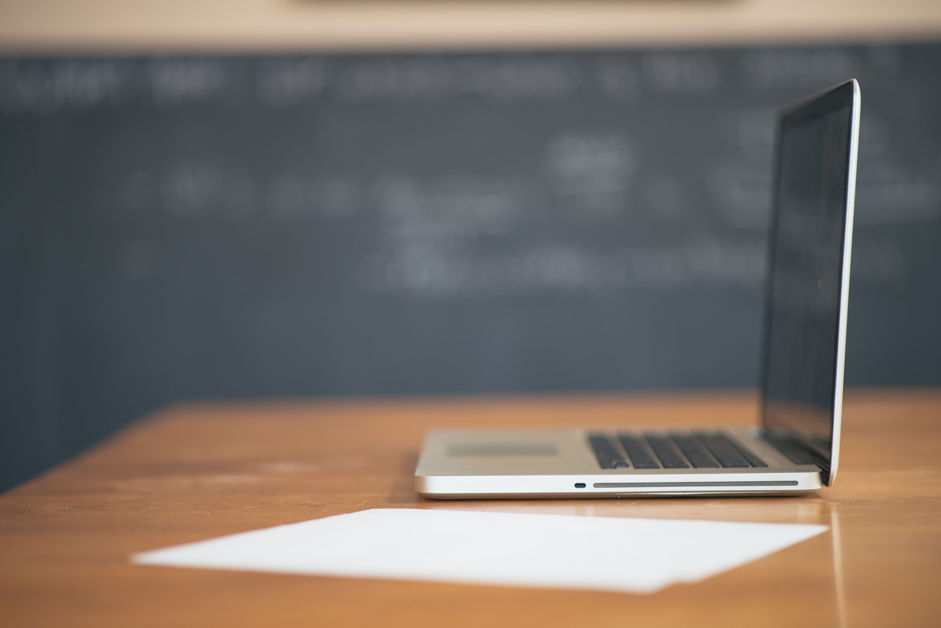 Laptop on a desk representing a side-by-side electricity provider comparison.