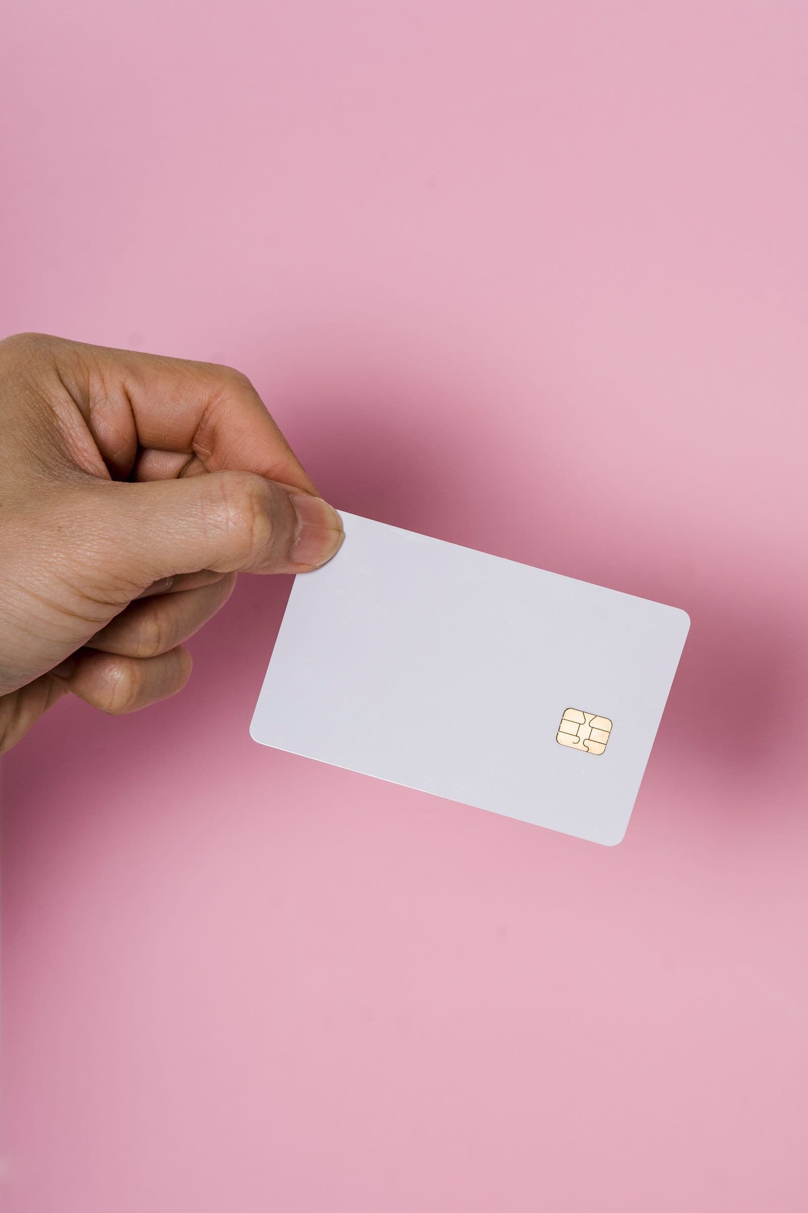 Person changing a SIM card while switching mobile providers