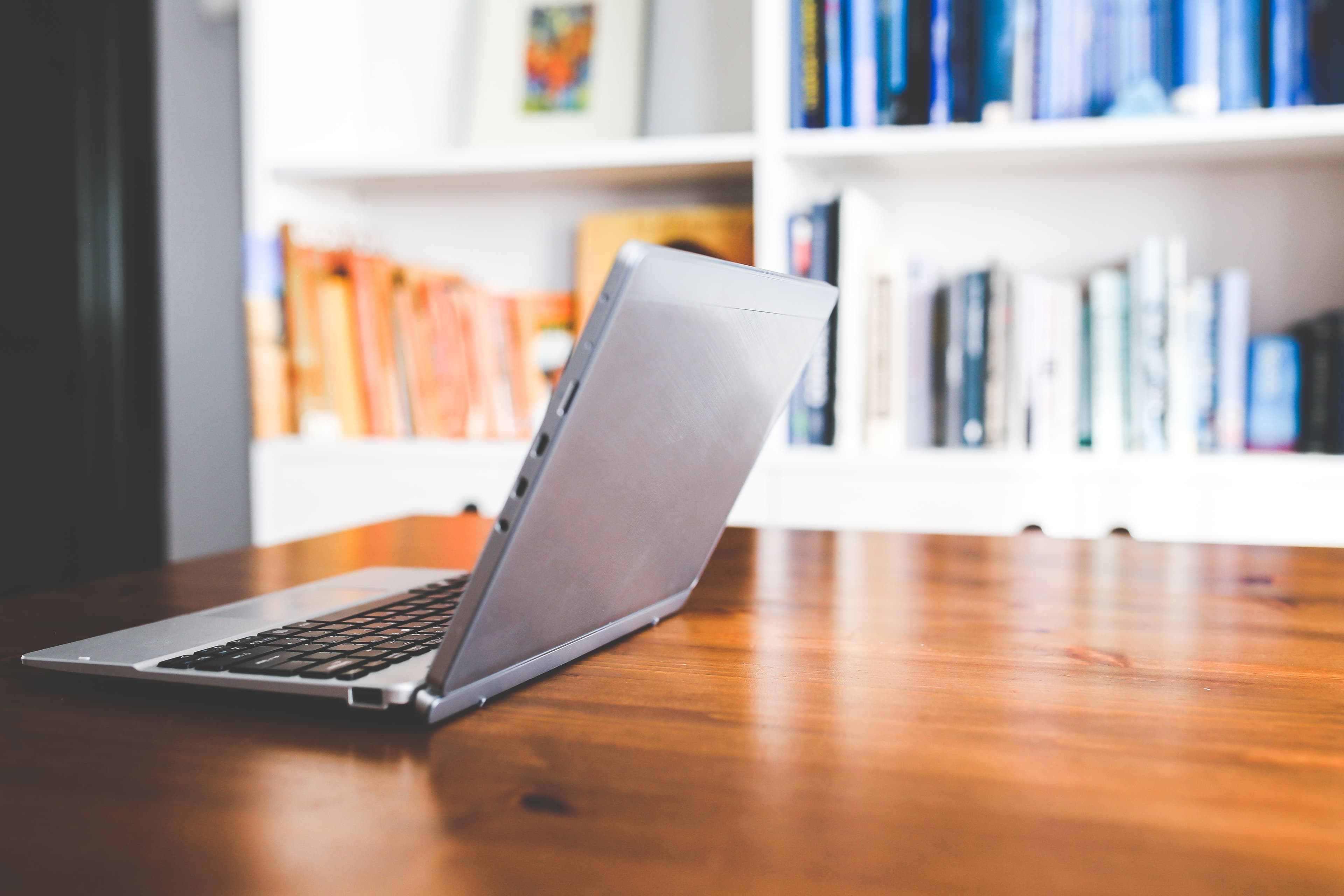 Laptop and desk setup used for comparing South Australian electricity plans.