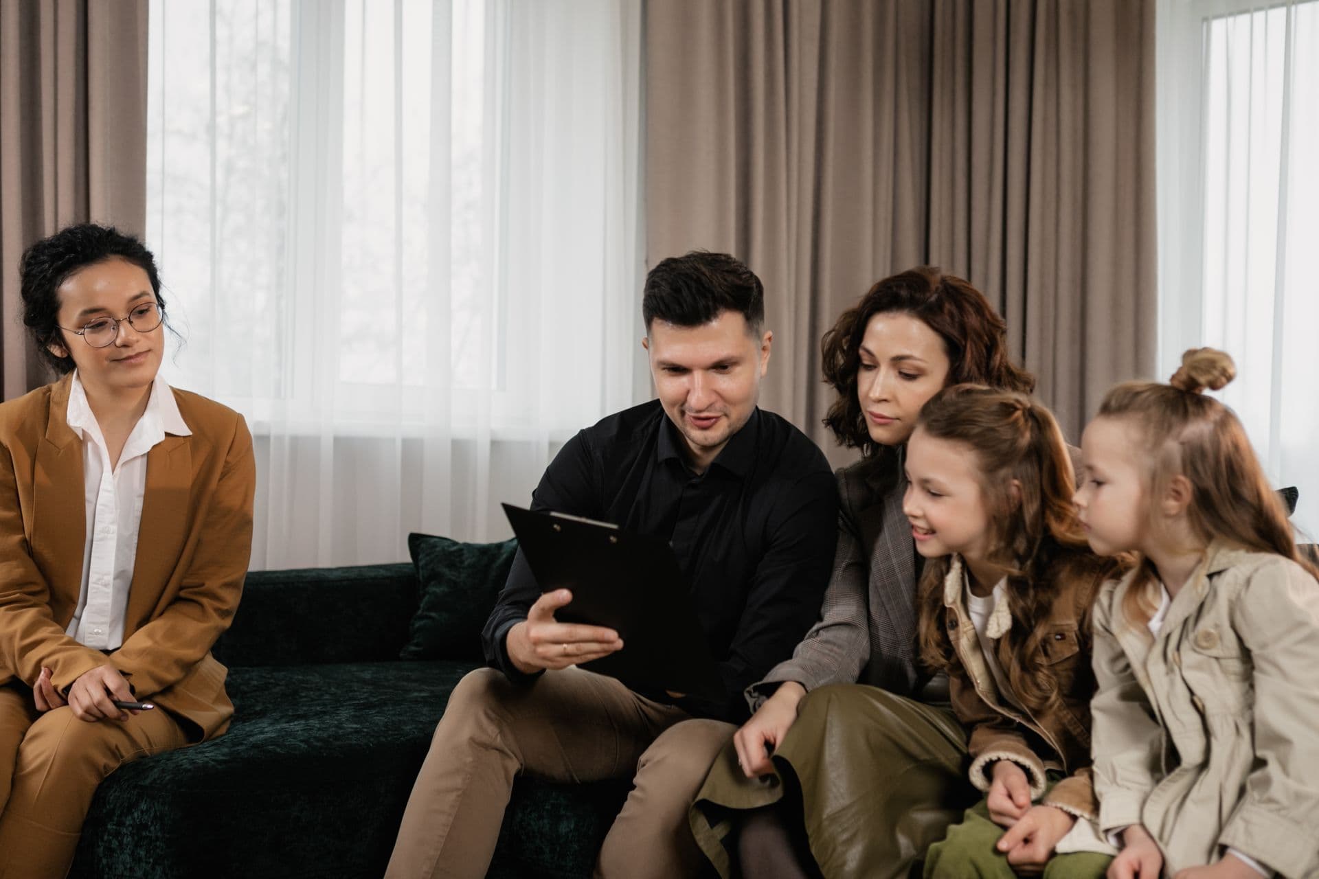 Household discussing bills with a financial support worker