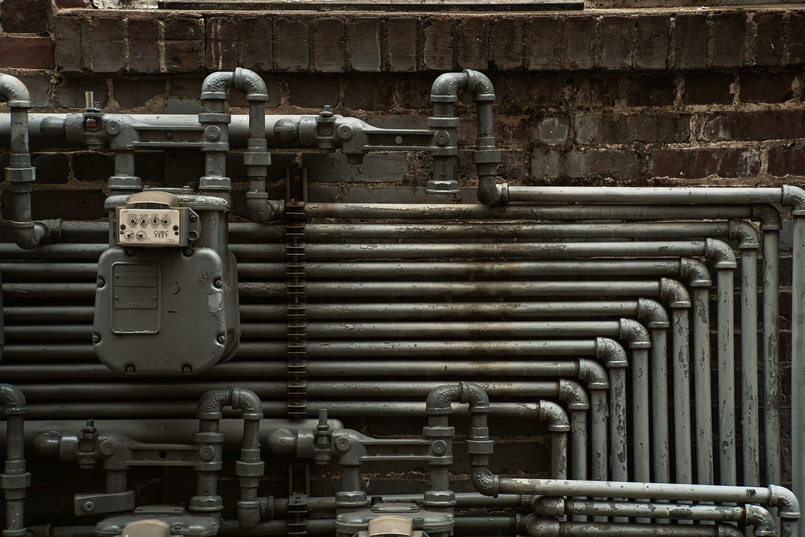 Gas meters and exterior pipework; illustrative image, not a MIRN label example