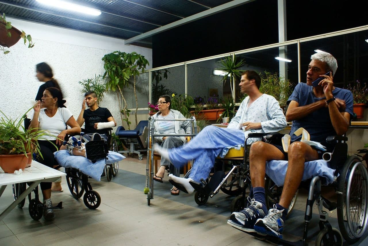 Patient in a physiotherapy setting representing Bronze cover