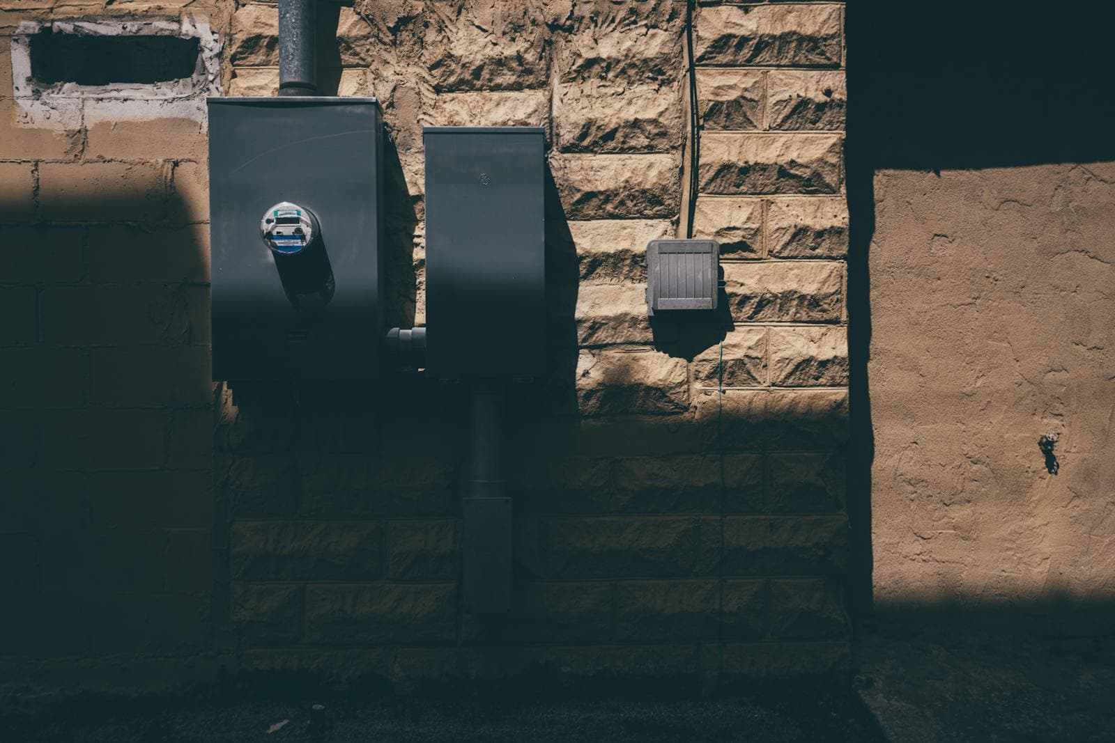 Electricity boxes on a wall for a regional NSW electricity guide