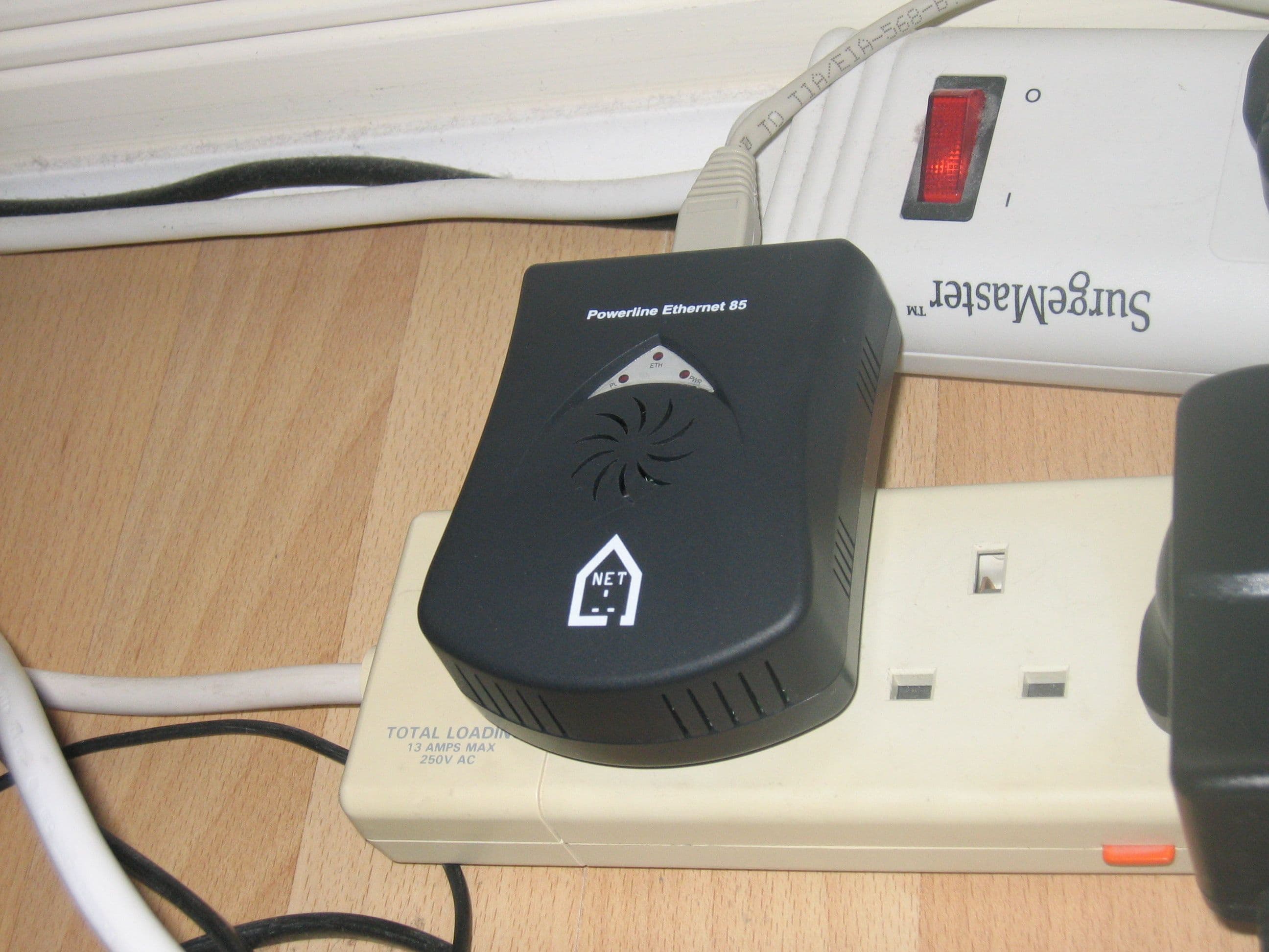 Ethernet socket photo for comparing wired and wireless home networking.