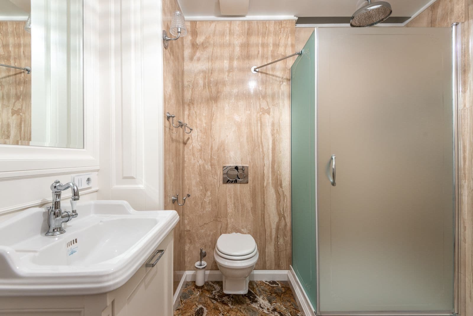A residential bathroom with shower fittings