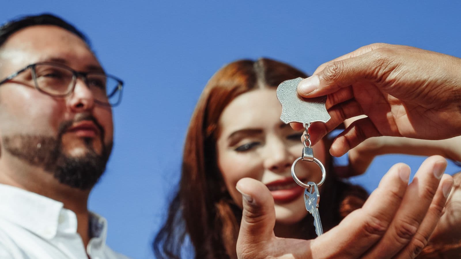 House keys being handed to a buyer