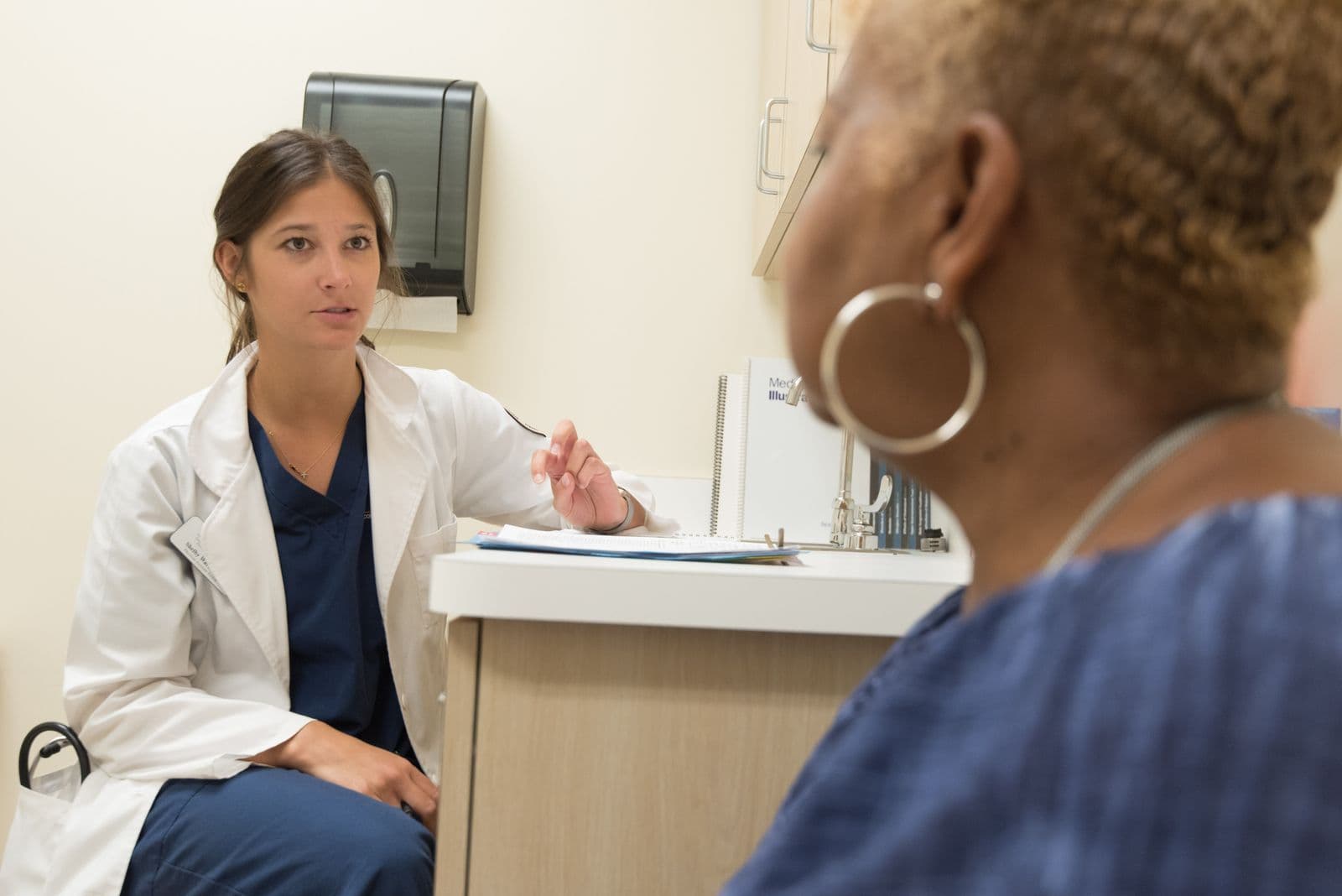 Healthcare professional consultation representing a Medibank review